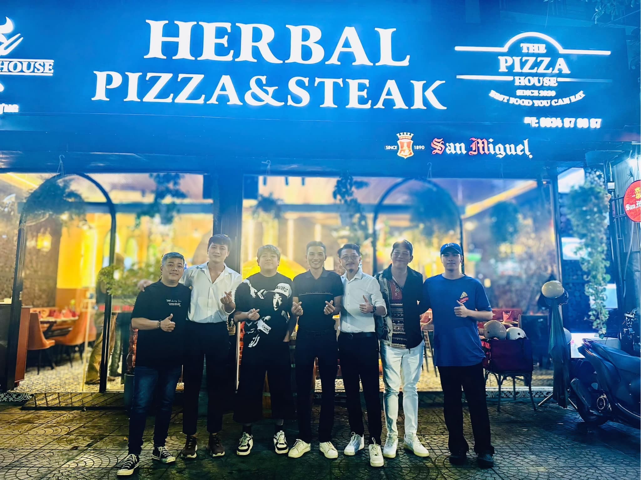 Herbal Pizza and Steak Hoi An has a warm and inviting setting with a touch of modern elegance